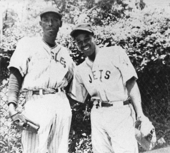 Lorenzo Loze (l.) in his Eagles baseball uniform and Richy John (r.) in his Jets uniform.